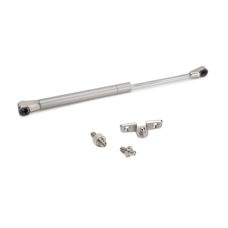 Piston Thin diamètre 12 avec fixations pour porte relevable, force 10 kg, Nickelé