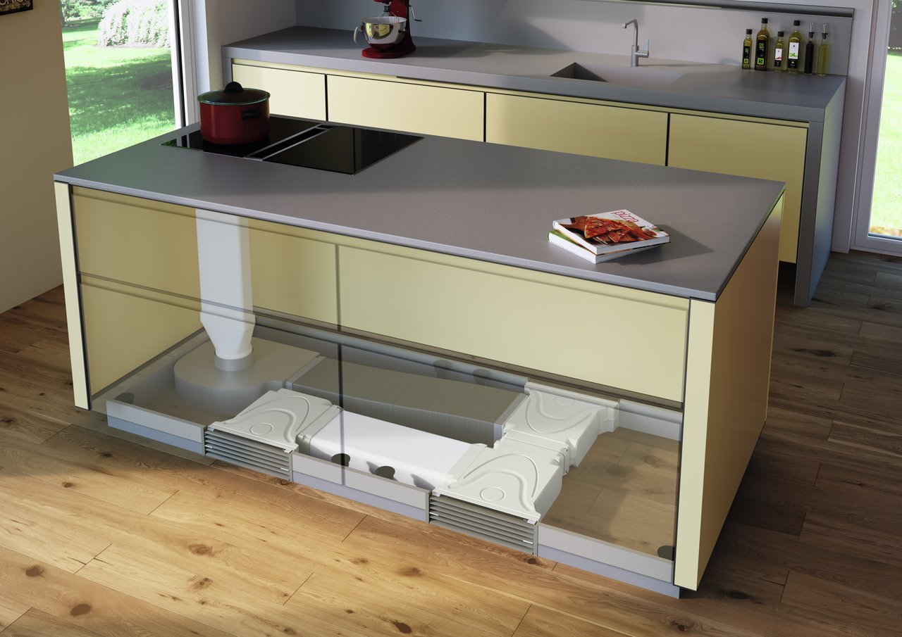 Îlot de cuisine moderne avec tiroirs beige et plan de travail gris, électroménager encastré et isolation sous l’îlot ouverte.
